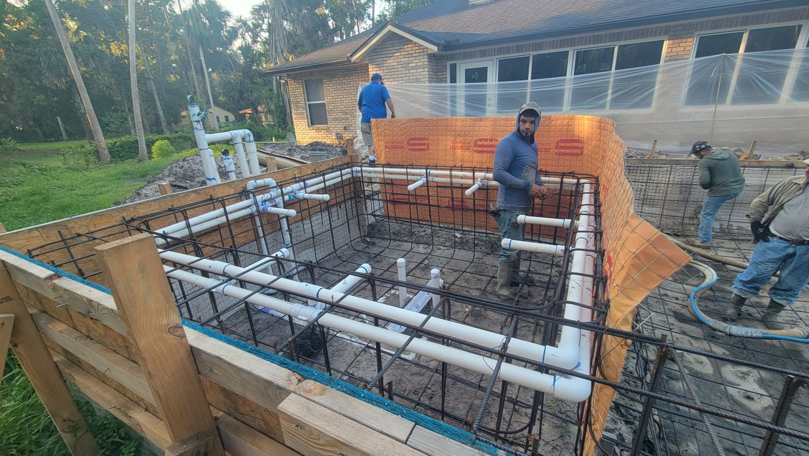 Rebar and PVC plumbing for a custom gunite pool and spa in Deltona